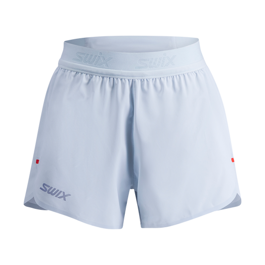 Light blue athletic shorts with Swix branding on a white background